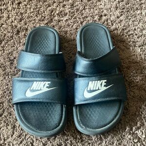 Black Nike slides